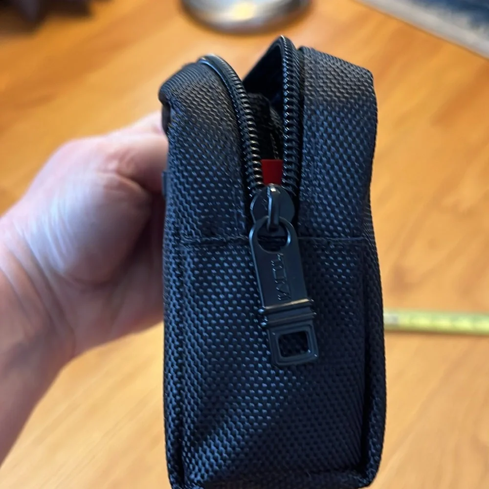 Tumi for Delta small black bag